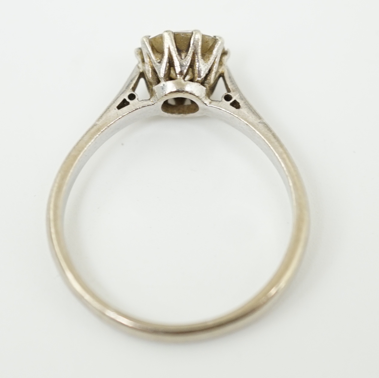 A white gold and solitaire diamond set ring